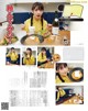 A magazine page with a picture of a girl eating food.