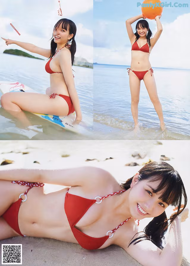 A woman in a red bikini laying on a beach.
